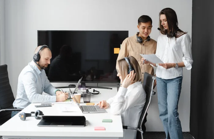 gathered at a desk
